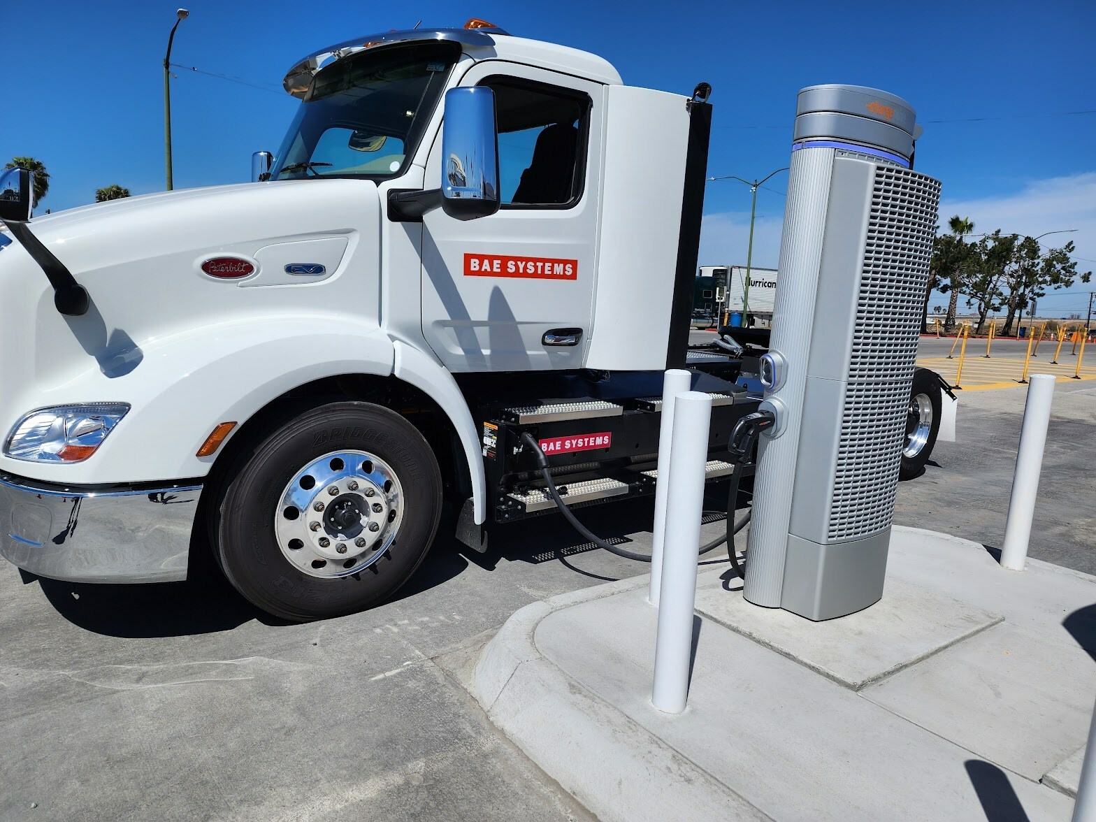 BAE Systems semi-truck recharging at the EV charging station