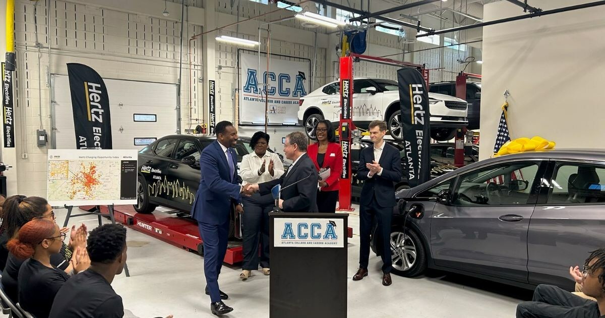 Hertz Chair and CEO Stephen Scherr and Mayor of Atlanta Andre Dickens shake hands at the launch of Hertz Electrifies Atlanta