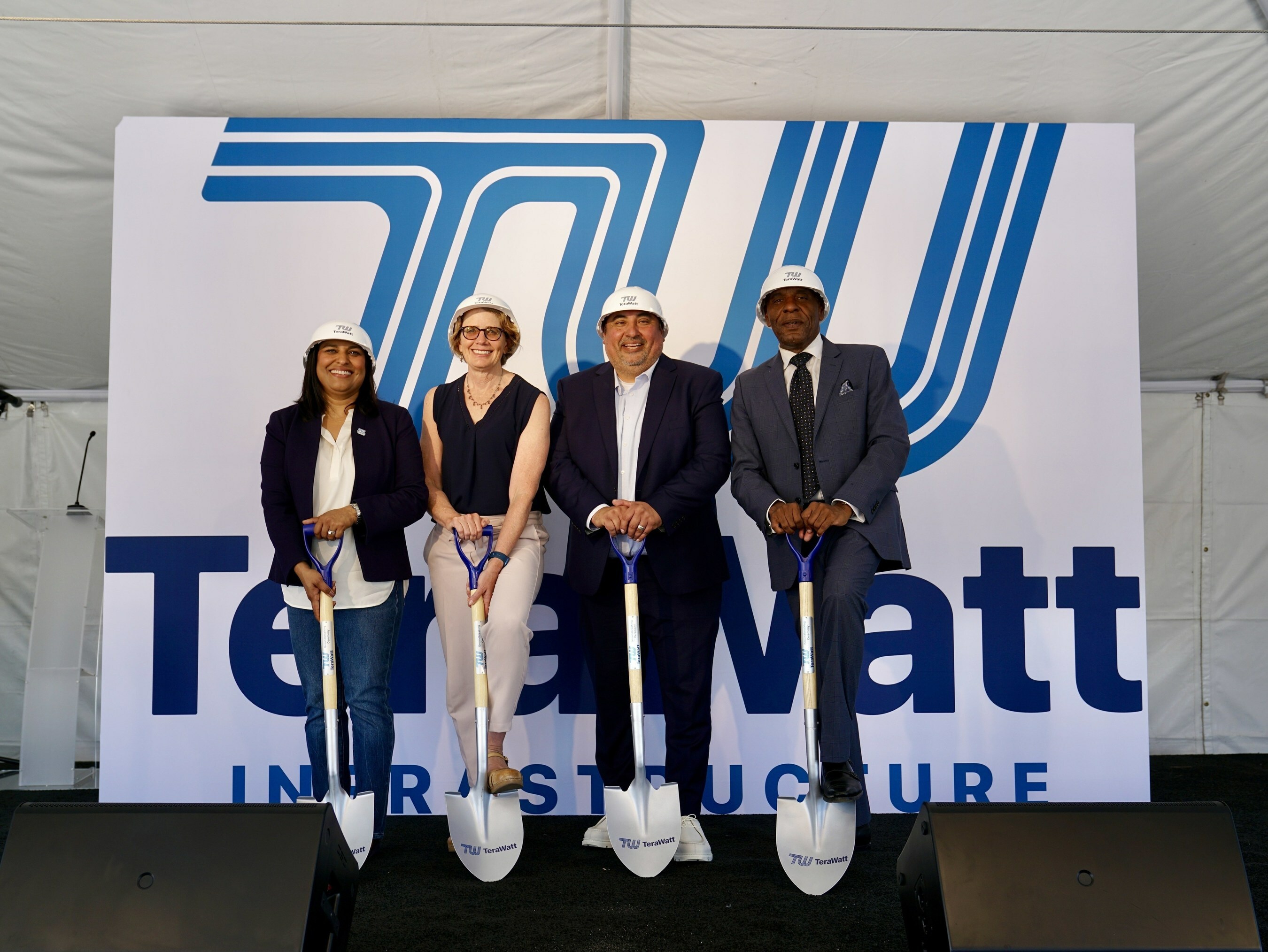 TeraWatt CEO & co-founder Neha Palmer, California Energy Commissioner Patty Monahan, Inglewood councilman Eloy Morales Jr., and State Senator Steven Bradford pose with shovels and hard hats at TeraWatt's LAX area groundbreaking ceremony in Inglewood, CA