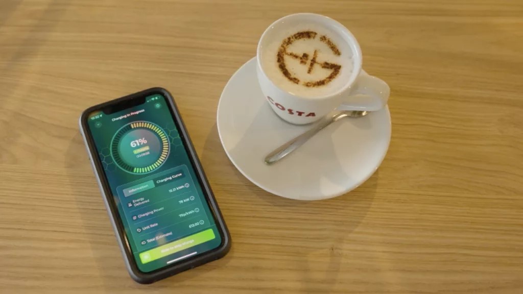 Gridserve app users can start, stop and monitor the real-time charging status of their vehicle with a few taps on their phone from the comfort of a nearby coffee shop. Photo: Gridserve