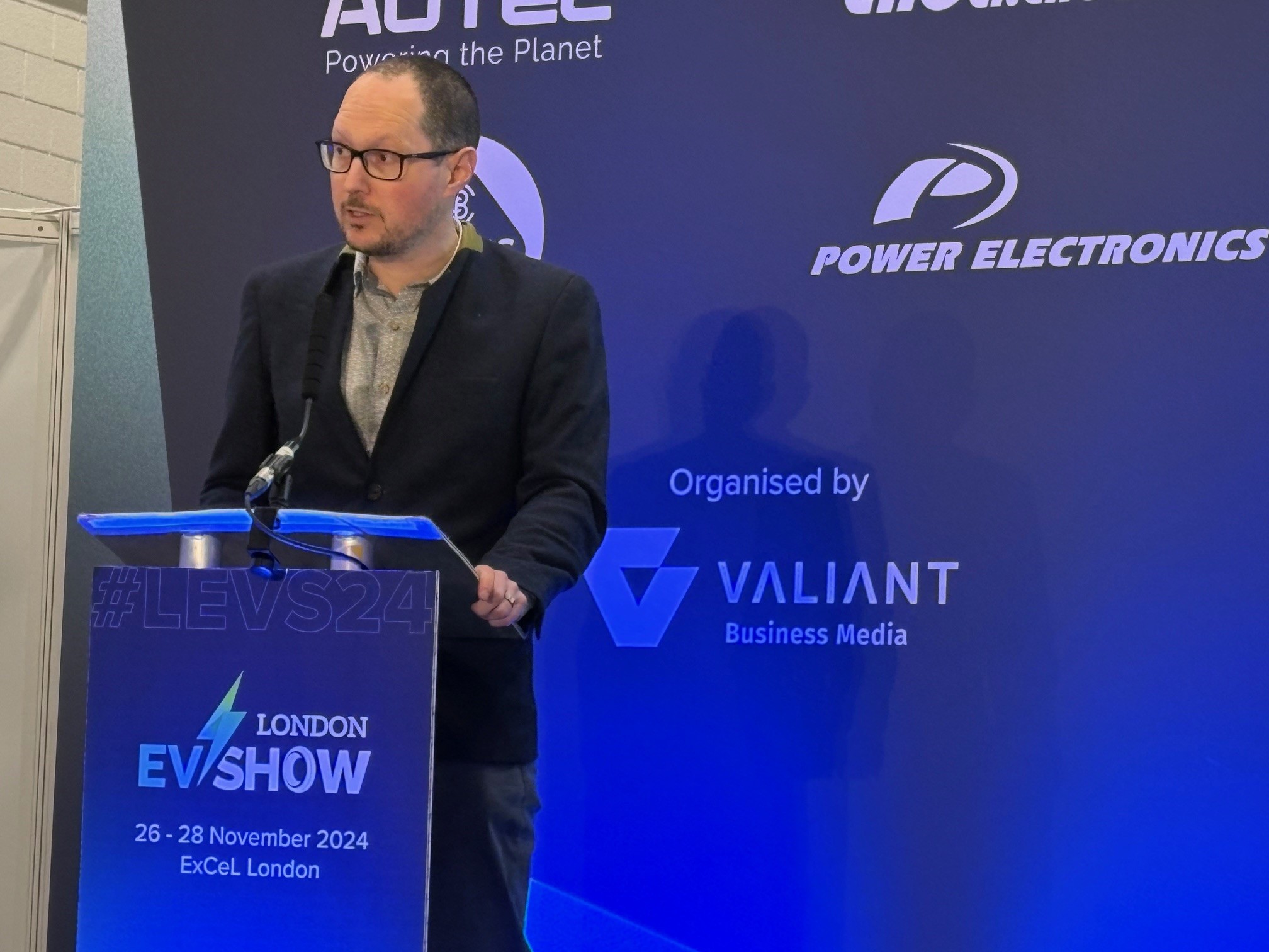 Matthew Eastwood speaking at the London EV Show