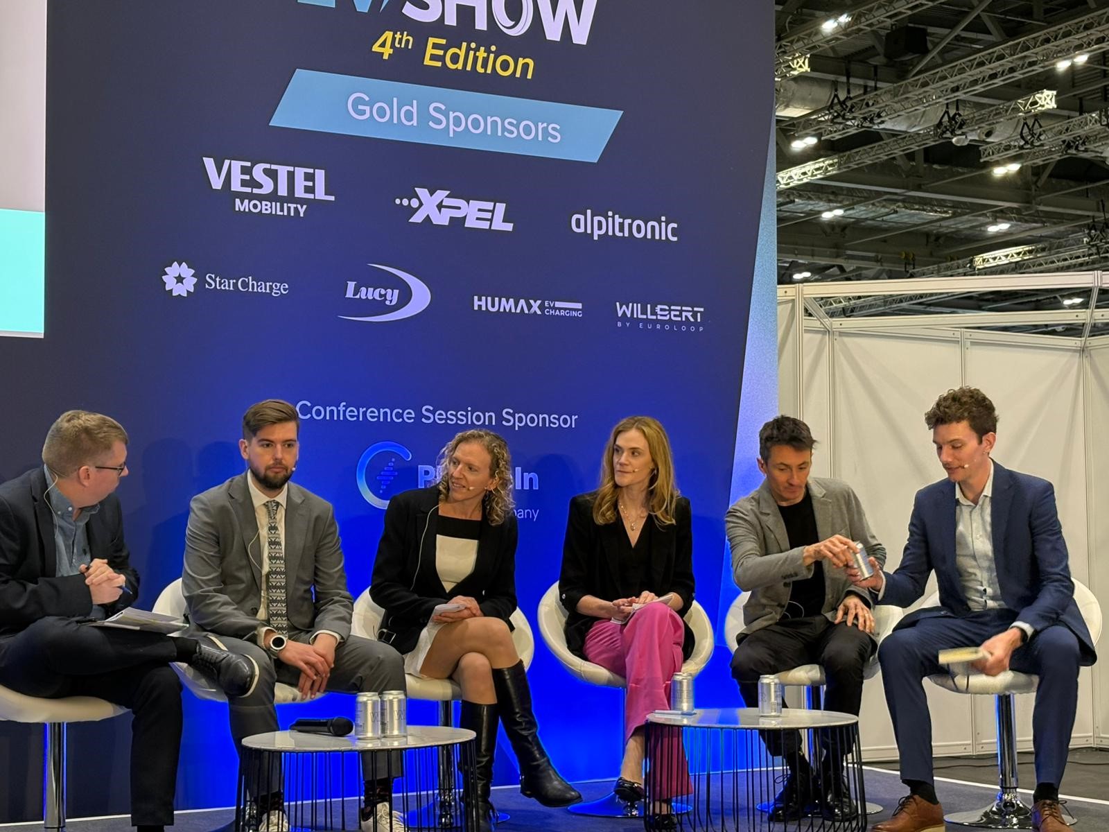 The panel discussion on pathways to electrify road transport at the 4th London EV Show on Tuesday November 26th. Left to right: Alec Peachey, editorial director, Transport + Energy; Thomas McLennan, head of policy and public affairs, BVRLA; Lucy Hayward-Speight, head of strategy and planning – environment, Transport for London; Charlotte Patch, head of electrification of heat and transport strategy, Ofgem; Marc Palmer, brand insight director, Auto Trader UK; Dr Roger Tyers, transport policy specialist, Hous