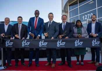 The ribbon cutting ceremony at Flo's new facility in Auburn Hills, Michigan (CNW Group/Flo)