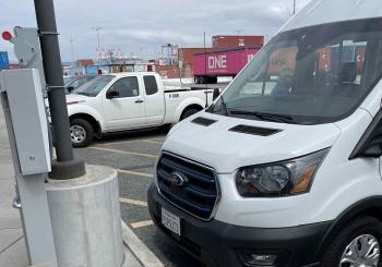 WiTricity is providing wireless charging for the International Transportation Service (ITS) America light-duty fleet at the Port of Long Beach. Depicted in the photo is a Ford Transit Connect powered by WiTricity’s Halo wireless charging unit. Photo: WiTricity