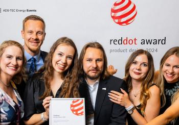 Ads-Tec Energy representatives were presented with the Red Dot Design Award in Essen, Germany. Photo: Ads-Tec Energy