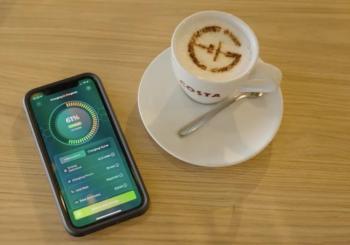Gridserve app users can start, stop and monitor the real-time charging status of their vehicle with a few taps on their phone from the comfort of a nearby coffee shop. Photo: Gridserve