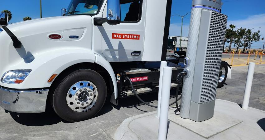 BAE Systems semi-truck recharging at the EV charging station