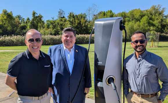 From left: Dan Fedor, NA Senior Business Development Manager at EVBox, JB Pritzker, Illinois Governor And Sunny Patel, NA Senior Product Manager at EVBox with EVBox Iqon