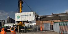 One of the two battery energy storage systems, which use re-purposed end-of-life EV batteries, being craned into position at Nottingham Council’s Eastcroft Depot