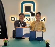 Quantum Volts CEO Lawrence Oei (left) and Emergence Innovative founder Kray Chong making the announcement that they will form a strategic alliance for EV charging innovations. Photo: Quantum Volts