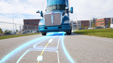 An electric semi truck charges while driving on a test dynamic wireless power transfer (DWPT) roadway located at Utah State University. Image: ASPIRE